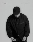 STRUCTURES 01. LEGACY COACH JACKET.